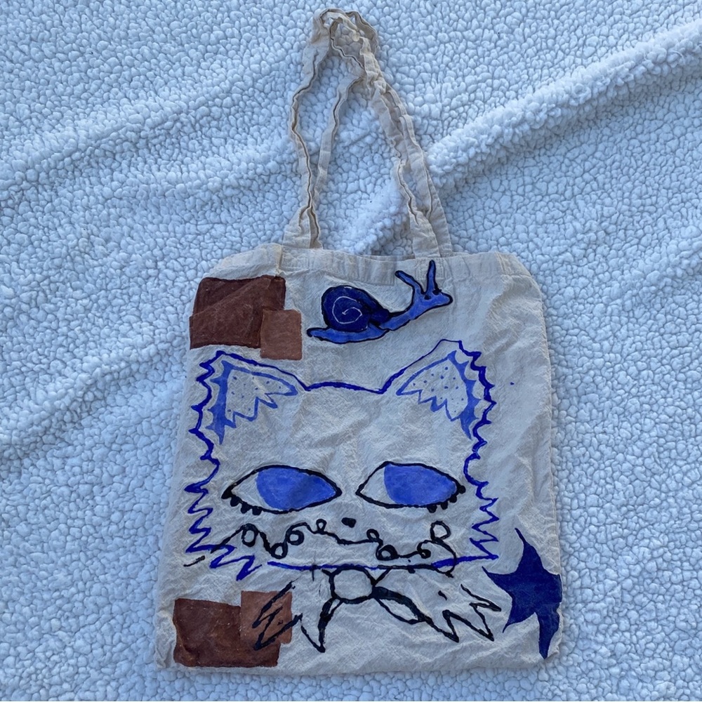 Cat and snail tote bag